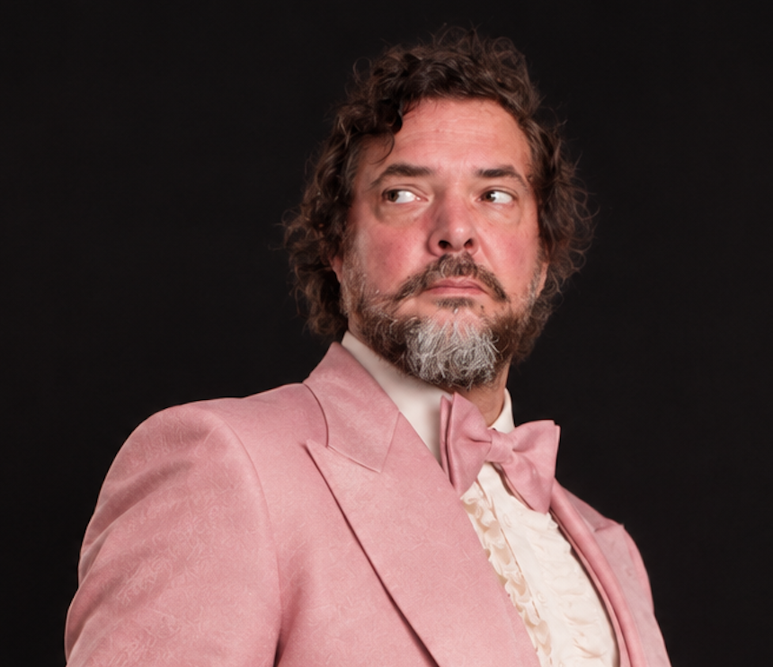 Maxwell Wright portrait in a pink tuxedo